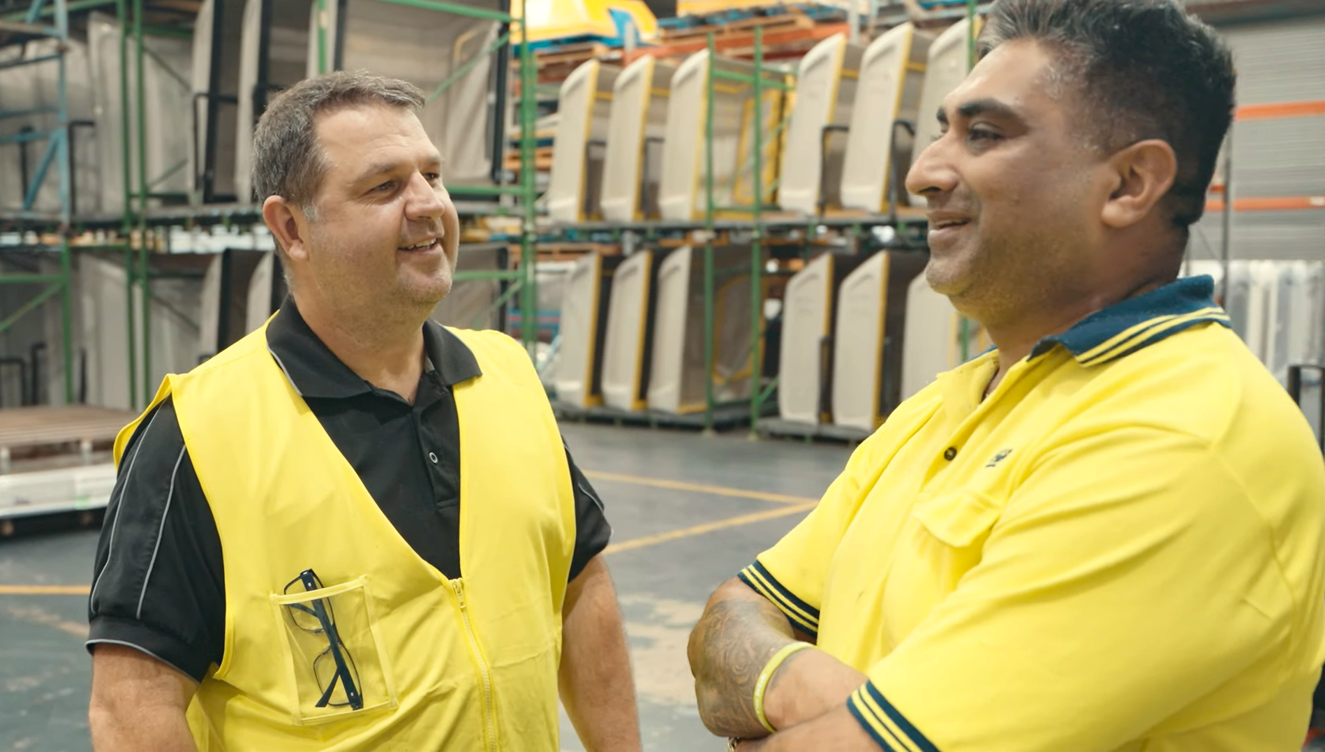 EGR team members talking on the warehouse floor